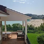 En Sanxenxo, Encima De La Playa Canelas *